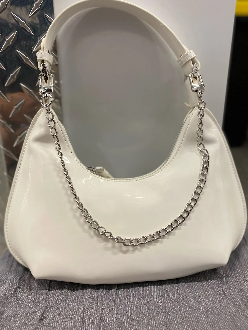 Elegant White Patent Hobo Bag with Chain Accent